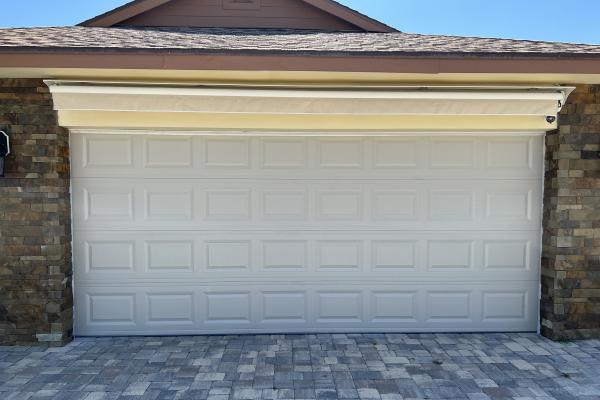 CHI model 2250 garage door installed by ABS Garage Doors in Palm Coast, Florida.