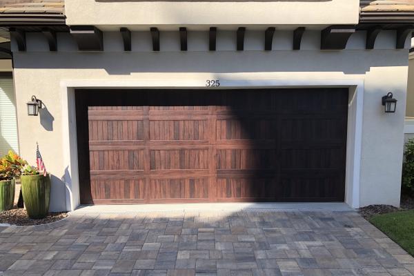 Accents Carriage Stamp Long Panel Garage Door in Mahogany