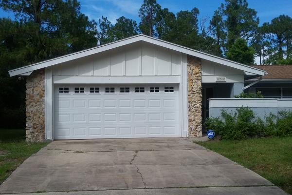 Raised Short Panel Garage Door with Stockton Glass Top Section